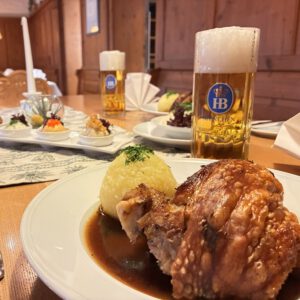 Pork knuckle with coleslaw and potato dumplings at the Erber restaurant in Ismaning