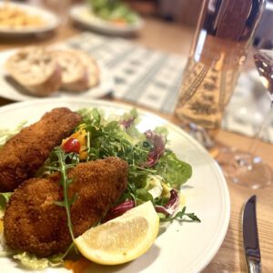 fried chicken with salat in the Restaurant Erber in Ismaning near Munich