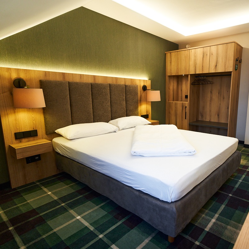 Deluxezimmer für eine Person mit großem Kleiderschrank